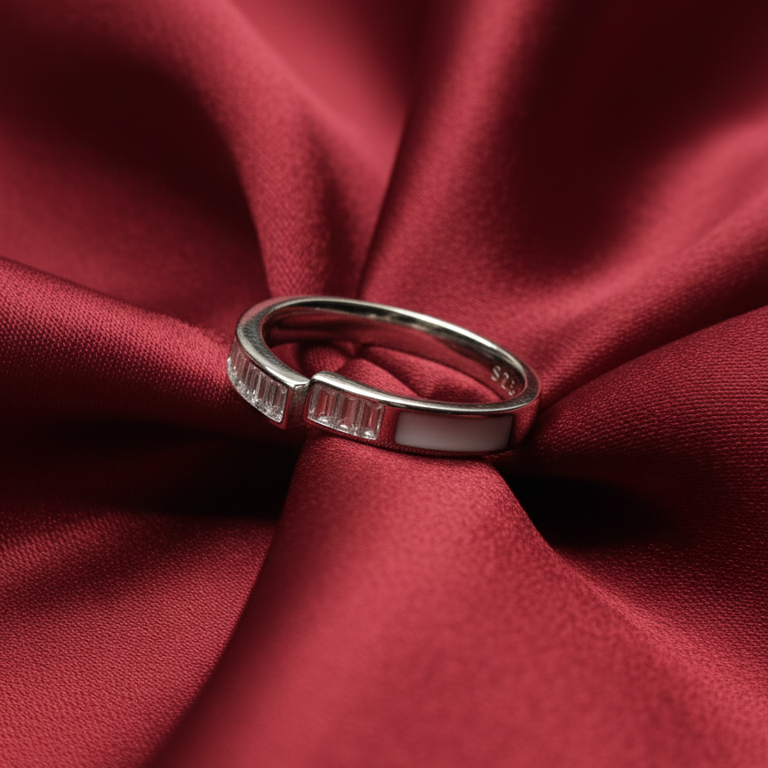 Rivansh linear channel ring in silver with calibrated AAA Cubic Zirconia on silk cloth backround