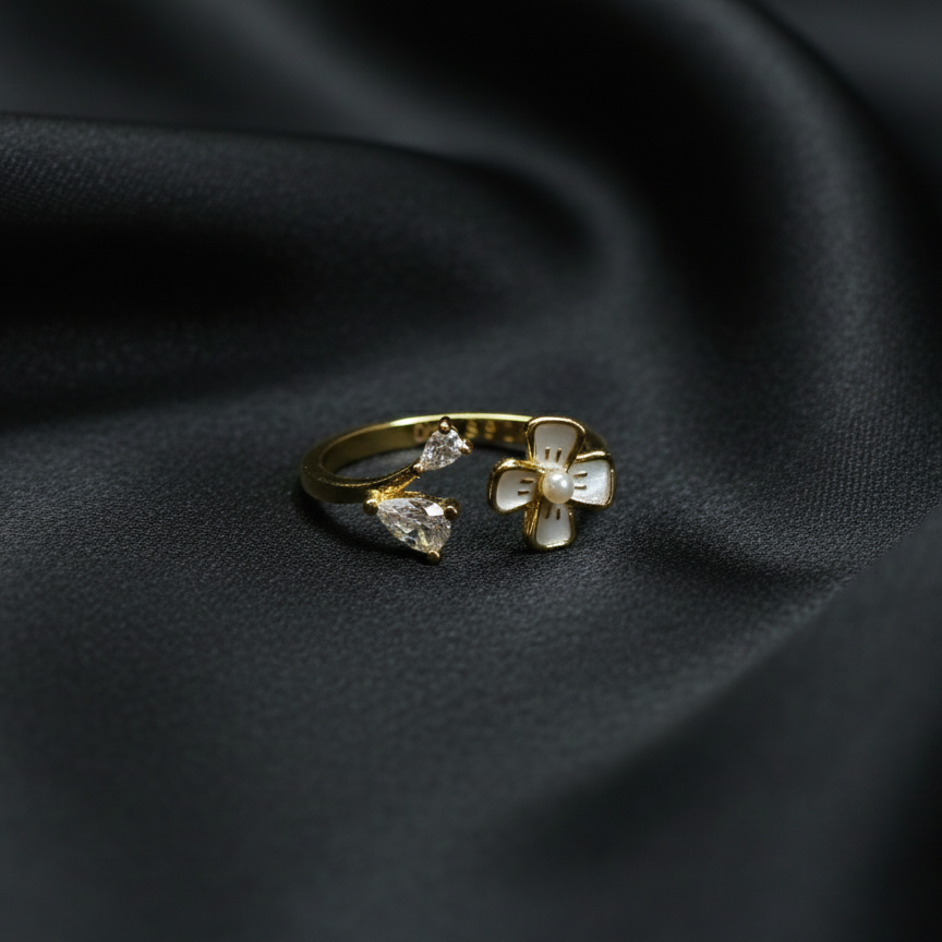 Rivansh oval cut halo solitaire ring in fine 925 silver with small claw set border stones on silk cloth