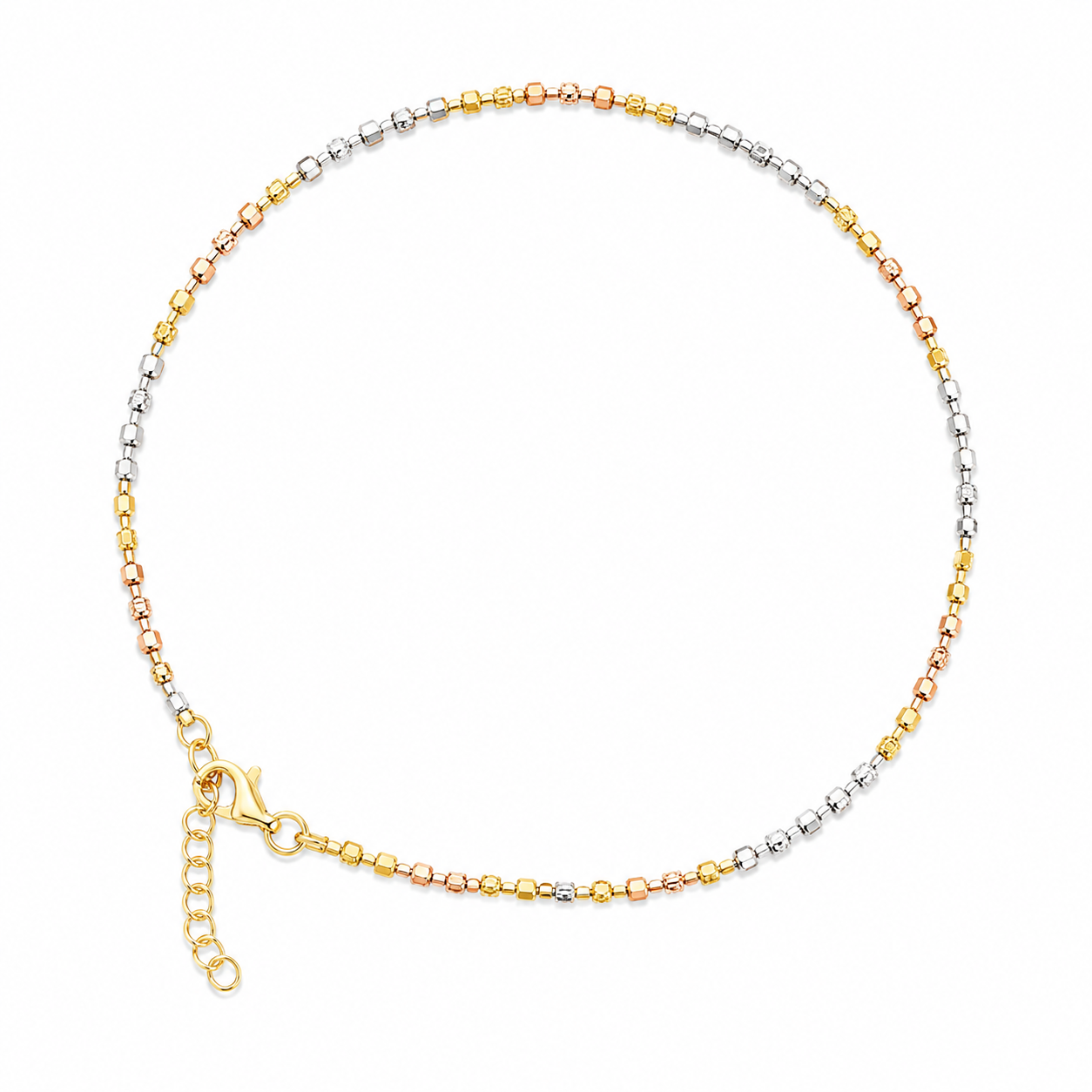 Three-tone gold anklet on a white background