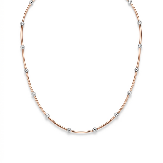 Alternating silver and rose gold toned micro sphere beads set along a 925 sterling silver chain.