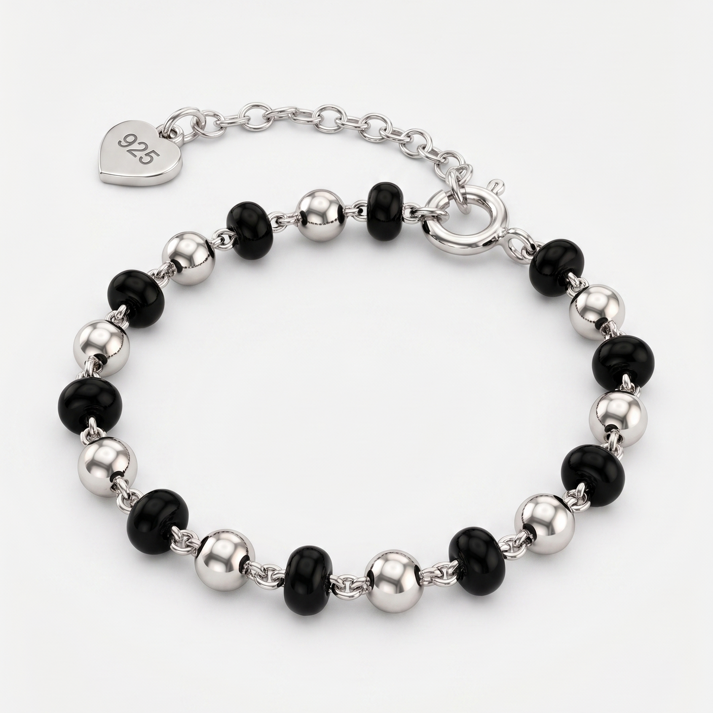 Bracelet with black and silver beads on a white background