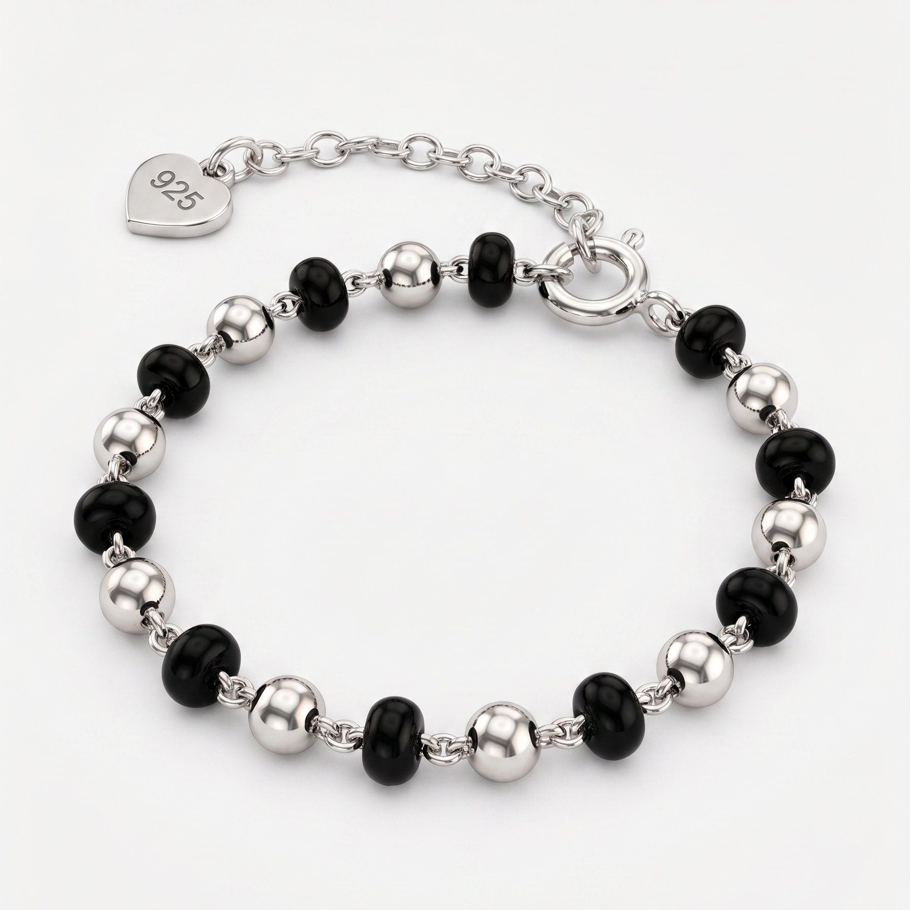 Bracelet with black and silver beads on a white background