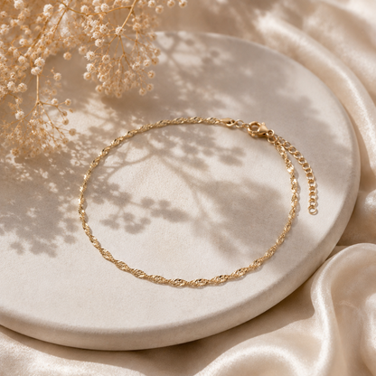 Dainty and delicate 925 silver Singapore chain anklet with a yellow gold-plated twisted spiral weave.