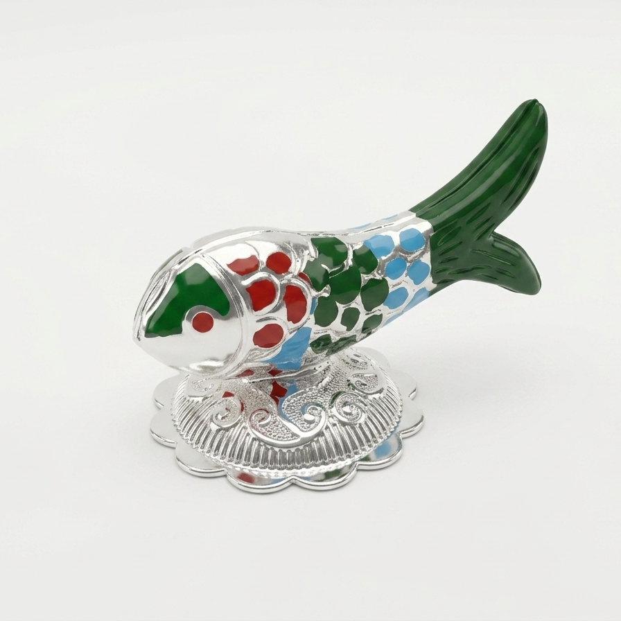 Decorative fish-shaped object with colorful pattern on a white background