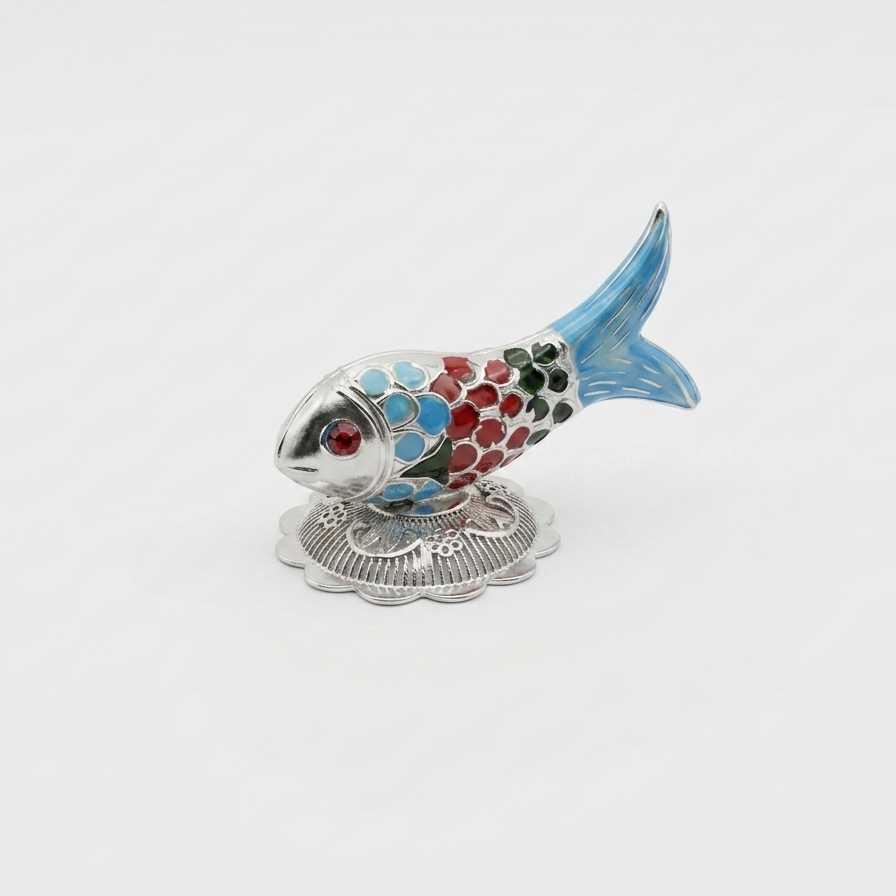 Decorative fish figurine with colorful body on a white background
