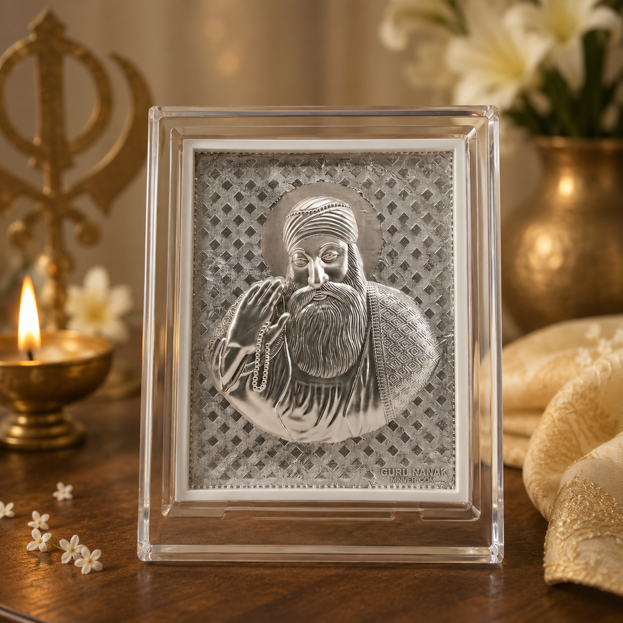 Decorative framed artwork of a bearded figure on a wooden surface with candles and flowers.