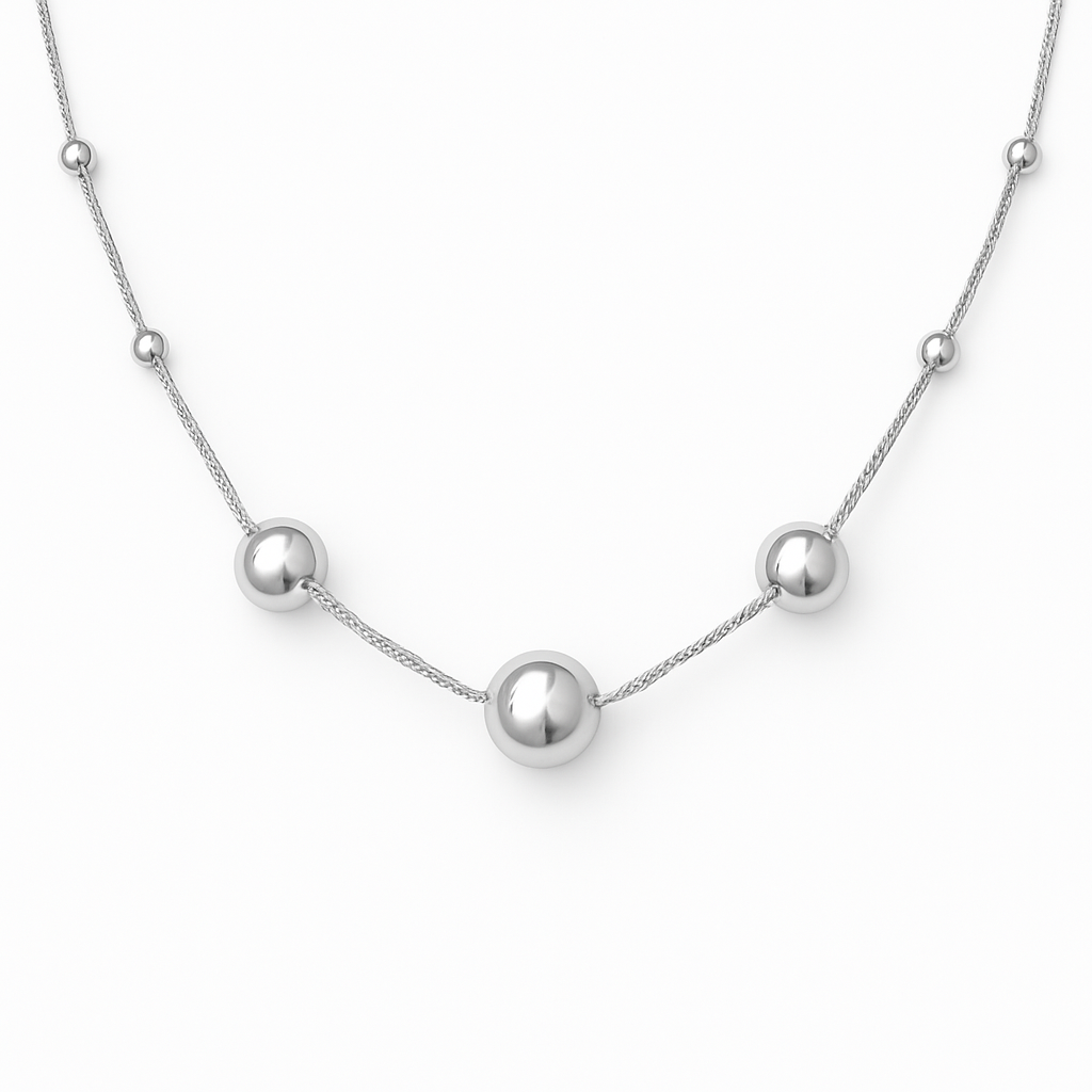 Polished 18-inch 925 sterling silver chain accented with integrated silver sphere beads.