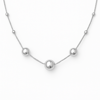 Polished 18-inch 925 sterling silver chain accented with integrated silver sphere beads.