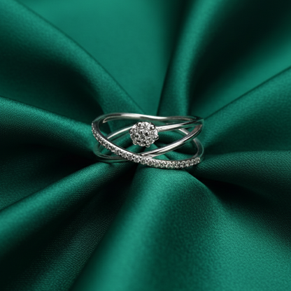 Rivansh aurelia wide mesh openwork structural lattice ring in micro polished 925 silver on green silk cloth