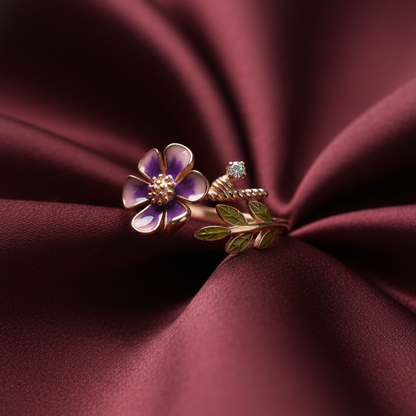 Rivansh curved wave accent ring in rhodium plated 925 sterling silver with an asymmetric micro-pave layout on silk cloth background.
