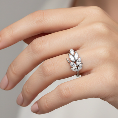 Rivansh eternal blossom halo statement ring in precious 925 fine silver featuring an elevated center gemstone mount on beautiful female model hand