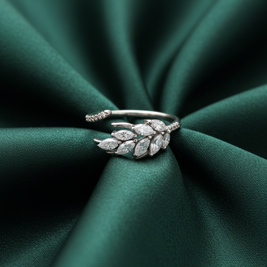 Rivansh eternal blossom halo statement ring in precious 925 fine silver featuring an elevated center gemstone mount on silk cloth background