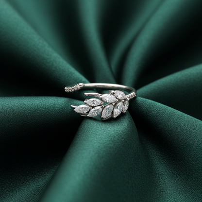Rivansh eternal blossom halo statement ring in precious 925 fine silver featuring an elevated center gemstone mount on silk cloth background