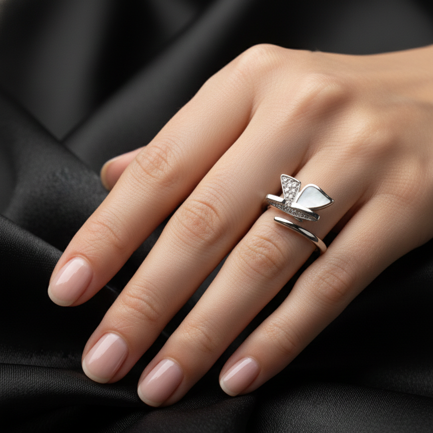 Rivansh horizontal east-west profile minimal solitaire ring in certified 925 fine silver on model finger