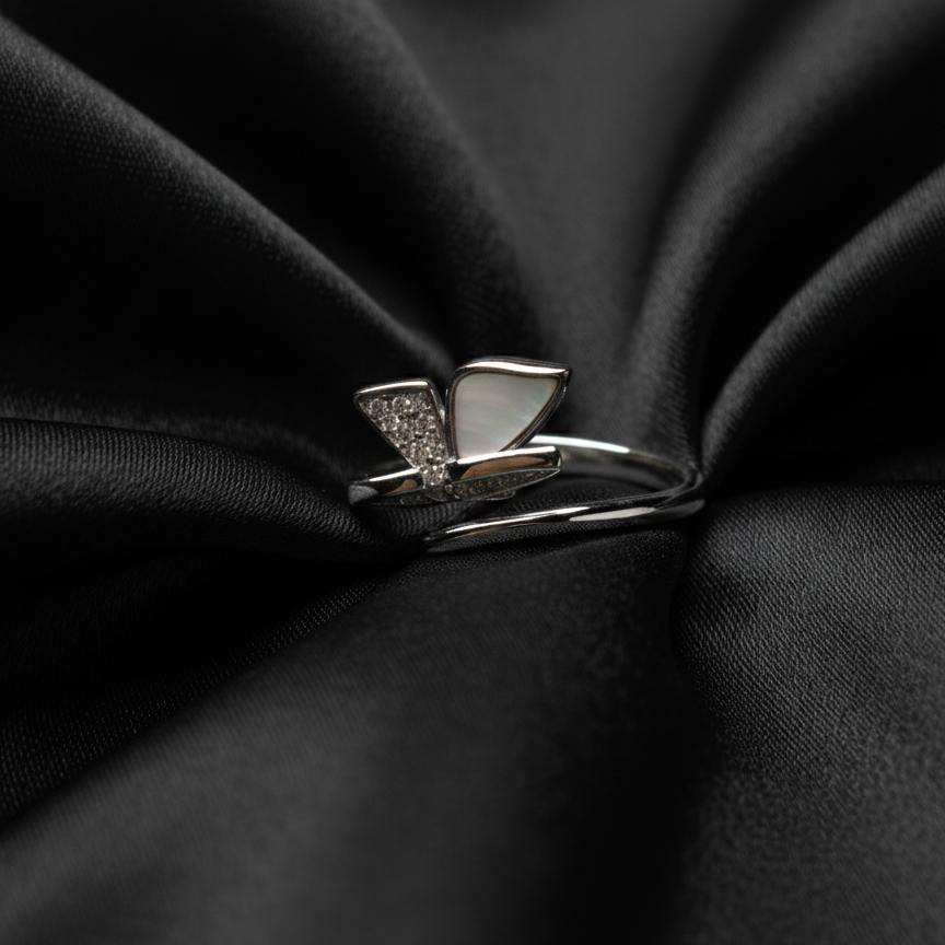 Rivansh horizontal east-west profile minimal solitaire ring in certified 925 fine silver on silk cloth