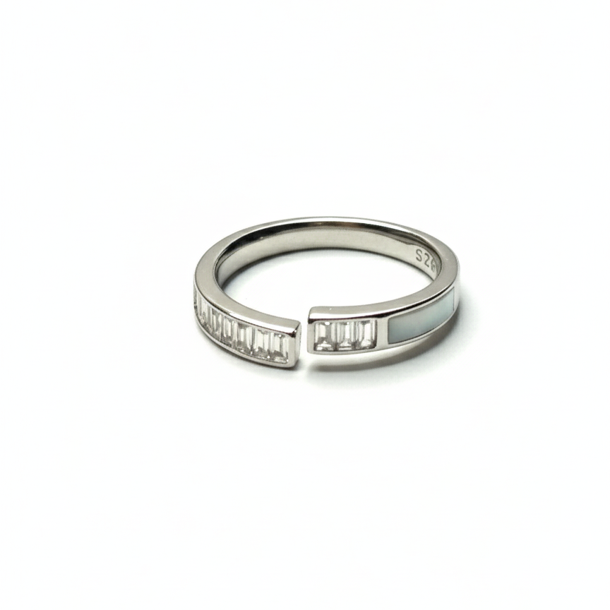 Rivansh linear channel ring in silver with calibrated AAA Cubic Zirconia.
