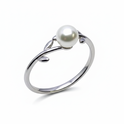 Rivansh minimal pure pearl ring featuring a single genuine freshwater pearl on a thin wire core band.