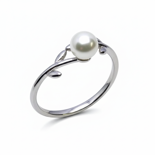 Rivansh minimal pure pearl ring featuring a single genuine freshwater pearl on a thin wire core band.
