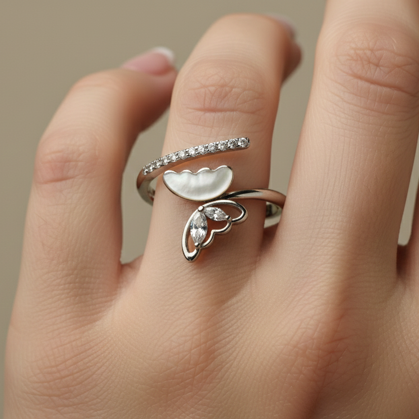 Rivansh openwork filigree butterfly ring in certified 925 silver set with fine point AAA Cubic Zirconia highlights on model fingure