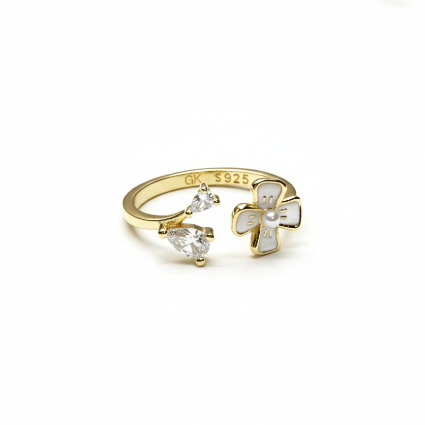 Rivansh oval cut halo solitaire ring in fine 925 silver with small claw set border stones.