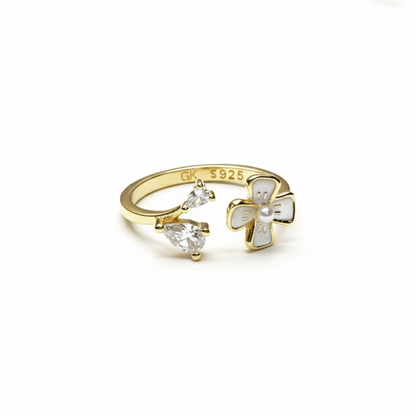 Rivansh oval cut halo solitaire ring in fine 925 silver with small claw set border stones.