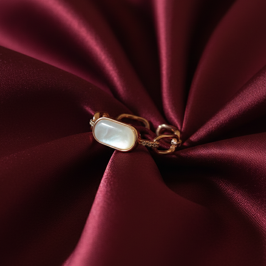 Rivansh regalia crown tiara ring in high-luster polished 925 fine silver set with bright gemstone peaks on silk cloth