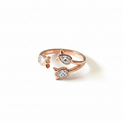 Rivansh split band crossover ring in mirror-polished 925 silver set with fine line micro-pave AAA zircons.