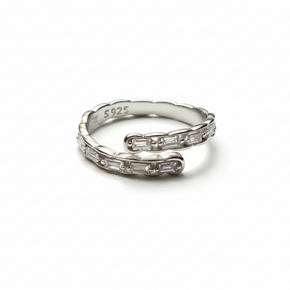 Rivansh star solitaire ring in pure 925 silver featuring a polished twisted rope band setting.