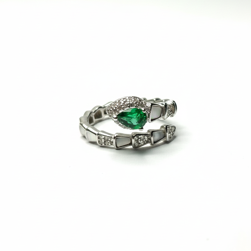 Rivansh water drop baguette solitaire ring in certified 925 silver with low-profile corner prongs.