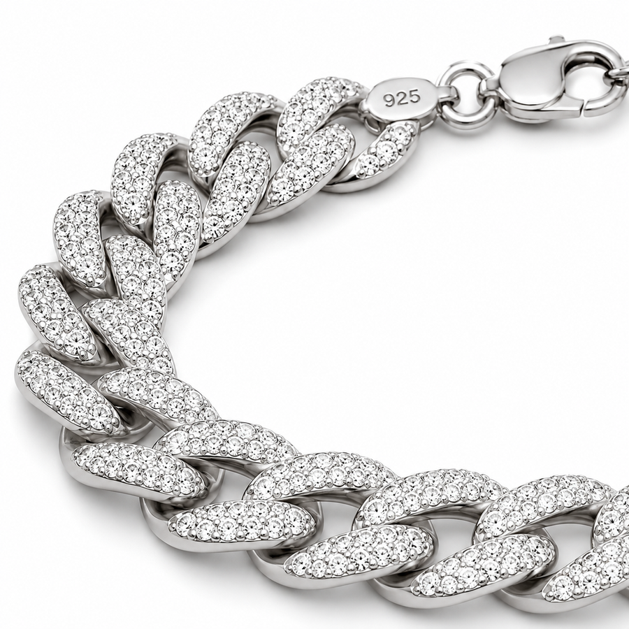 Silver chain bracelet with clear stones on a white background