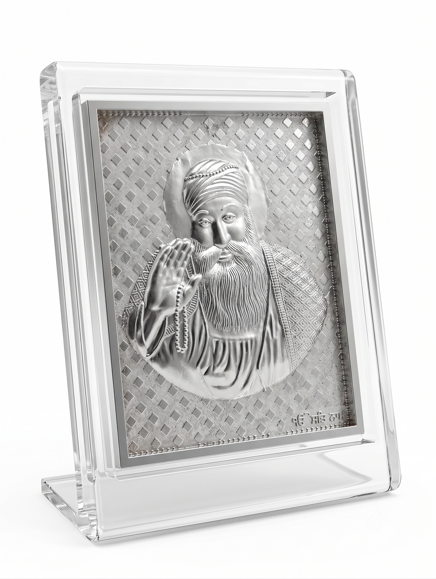 Silver religious icon in a clear acrylic frame on a white background