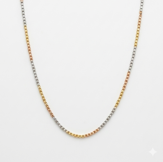 Tri-color faceted link chain highlighting mixed silver, yellow gold, and rose gold plating accents over a sterling silver base.