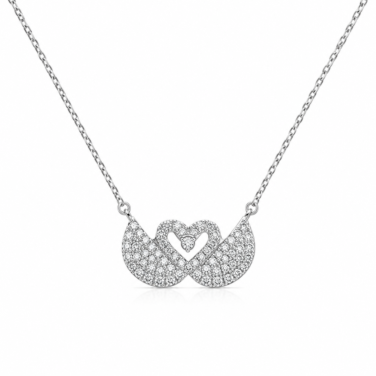 Two interlocking pavé-set swan charms connected to a polished 925 sterling silver link chain.
